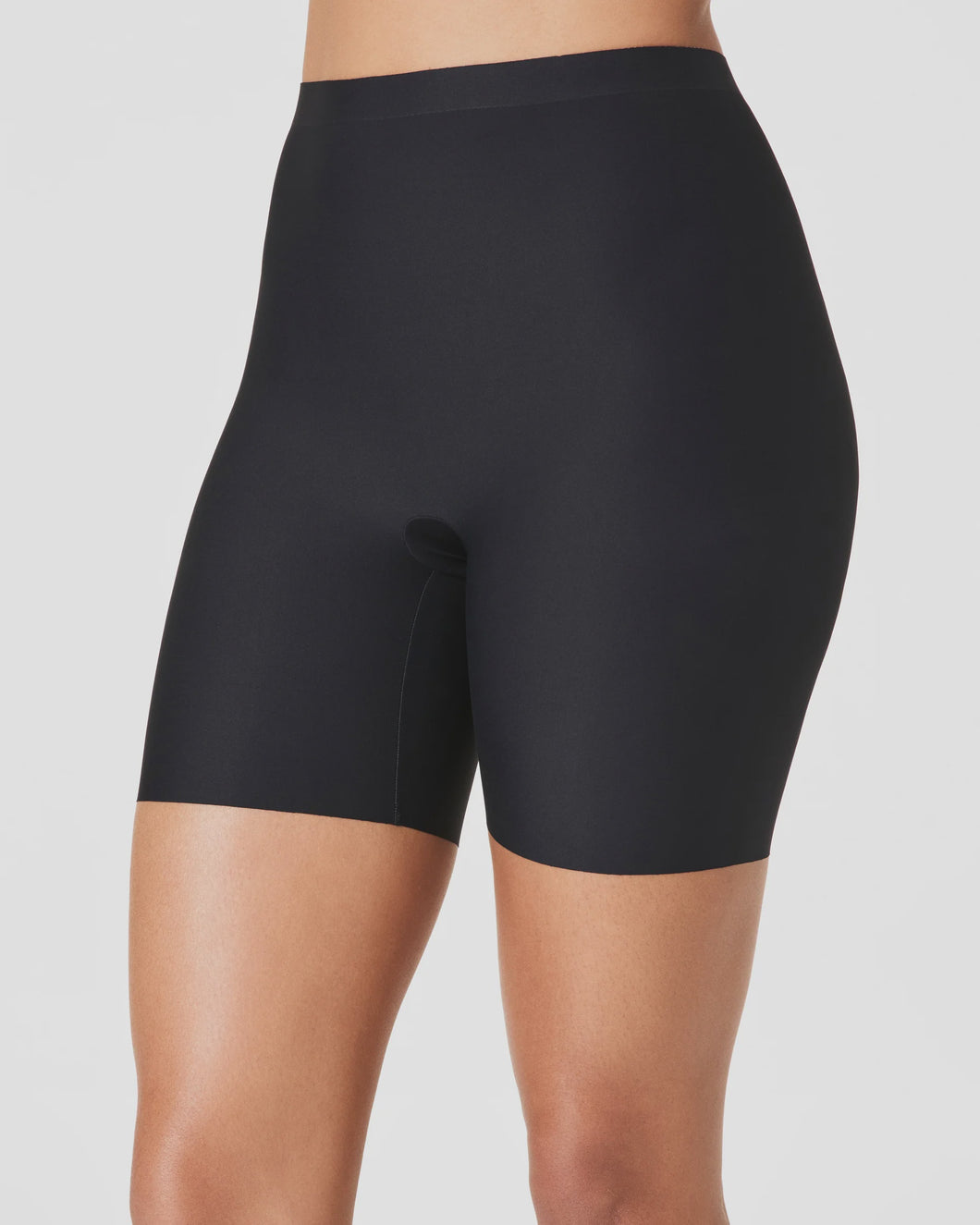 MID THIGH
